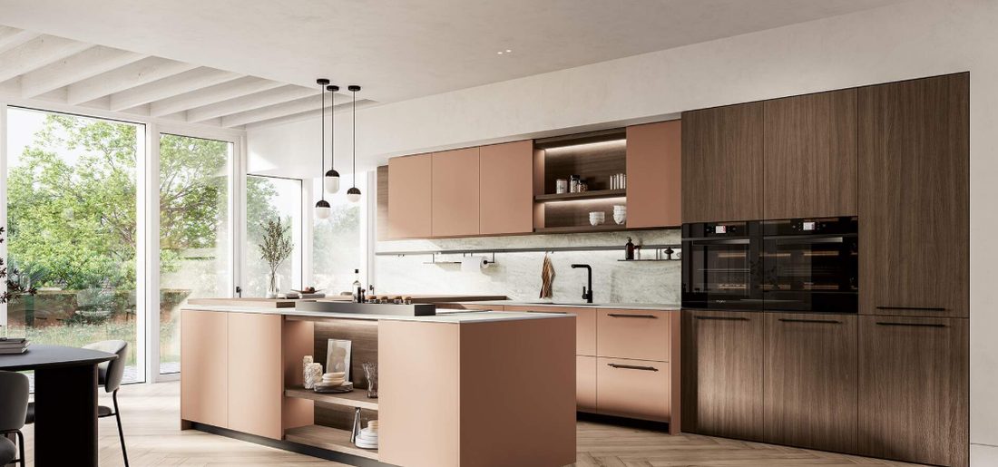 Cucina rosa terracotta e noce con isola